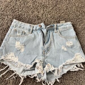 SHEIN Light Blue Ripped Denim Shorts
